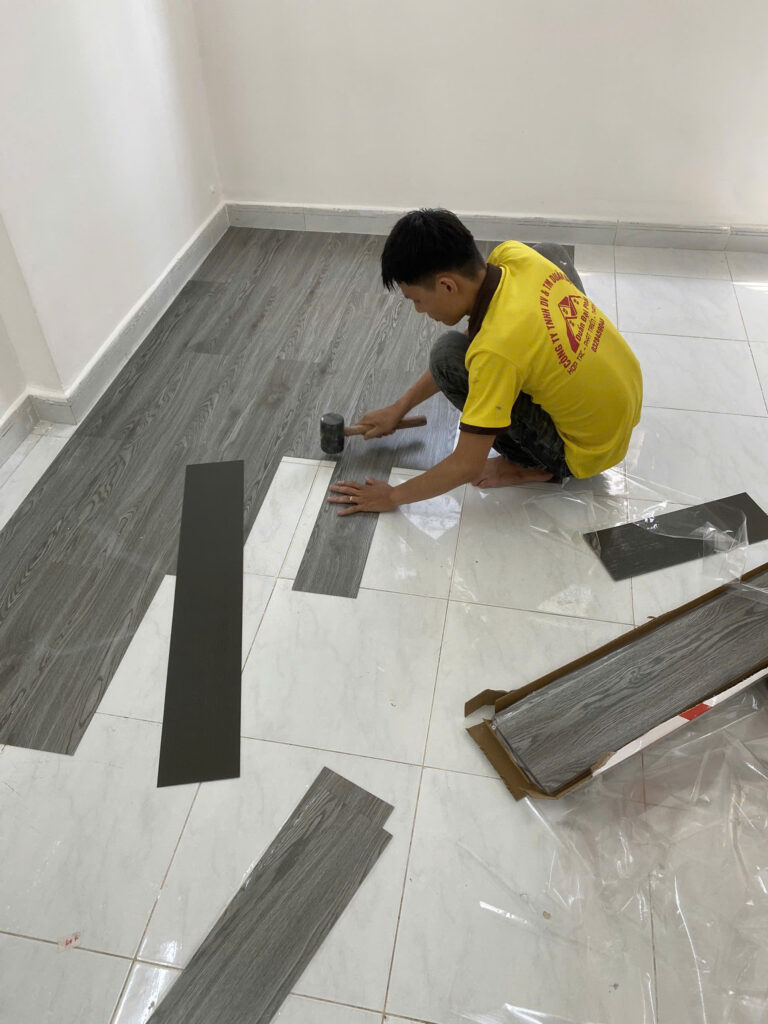 dịch vụ lắp đặt sàn nhựa giả gỗ ads