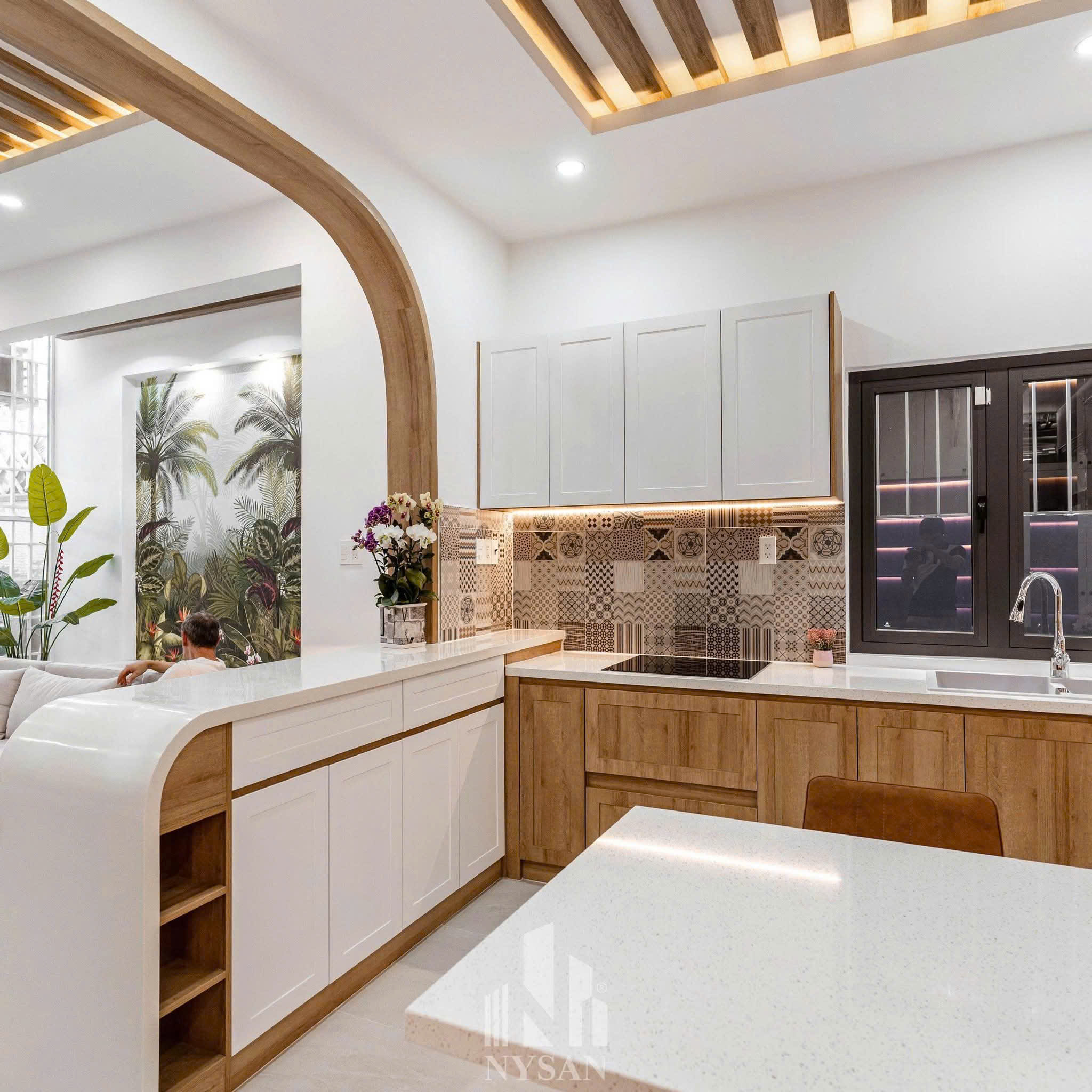 phong khách bố cục phòng bếp được d-home sắp xếp lại gòn gàng